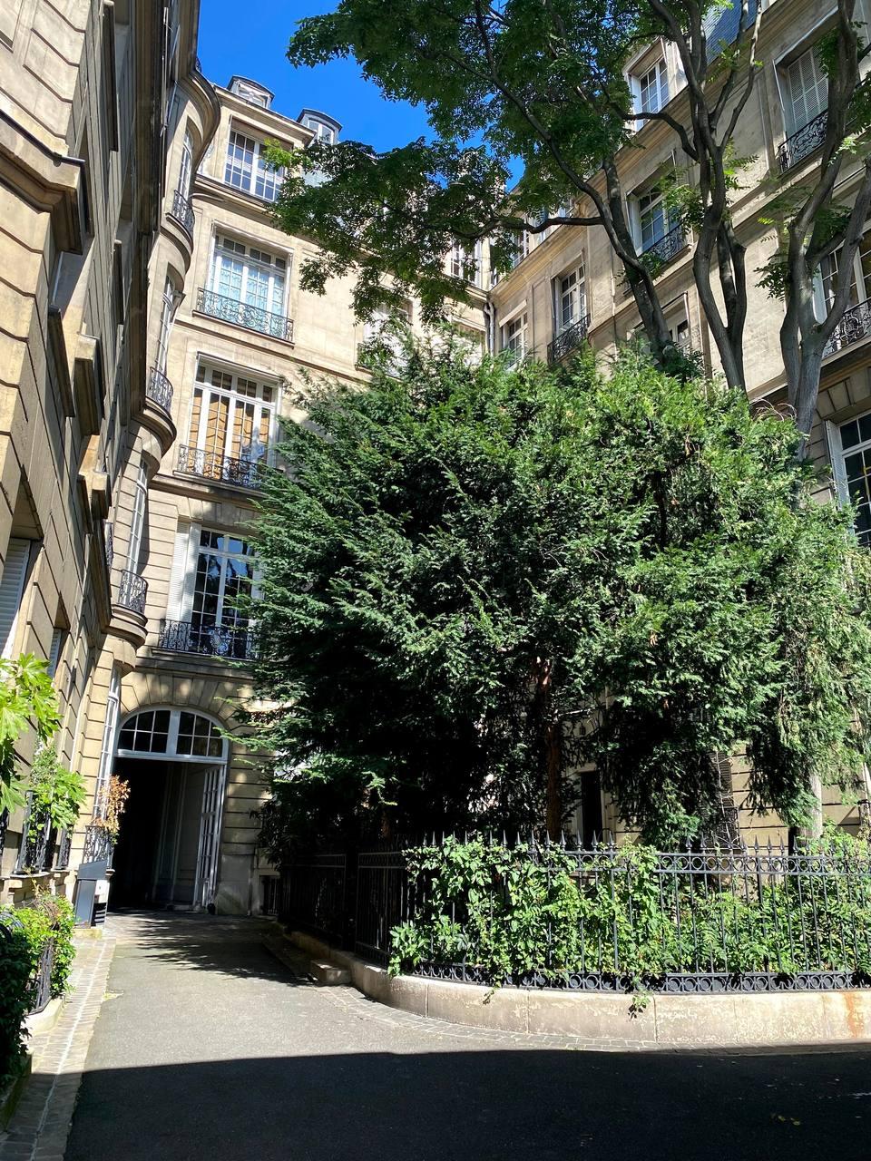 The building’s tree-lined inner courtyard